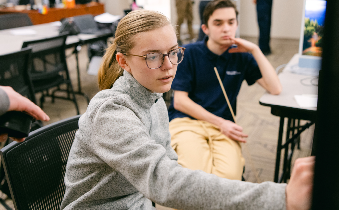 Student leading class discussion.